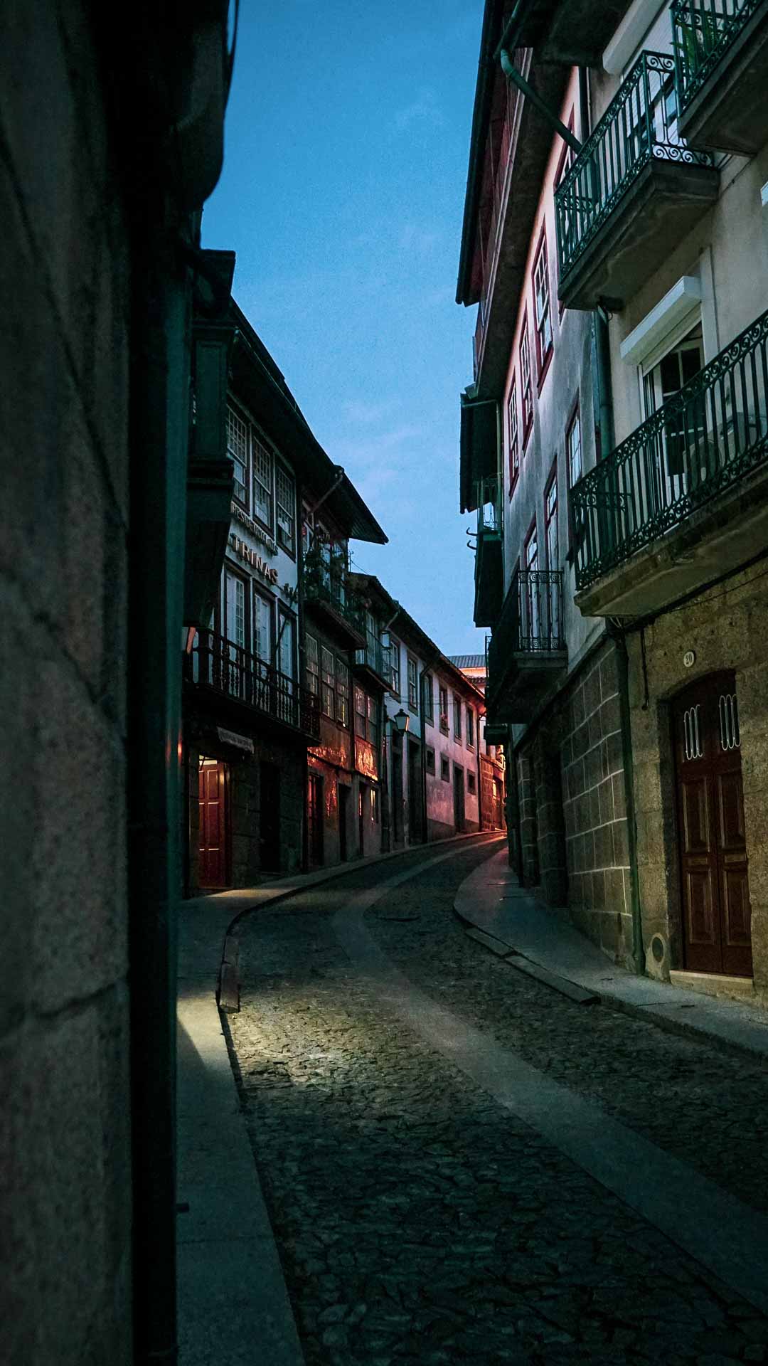 Guimaraes Travel Guide Image of street alleyway at night