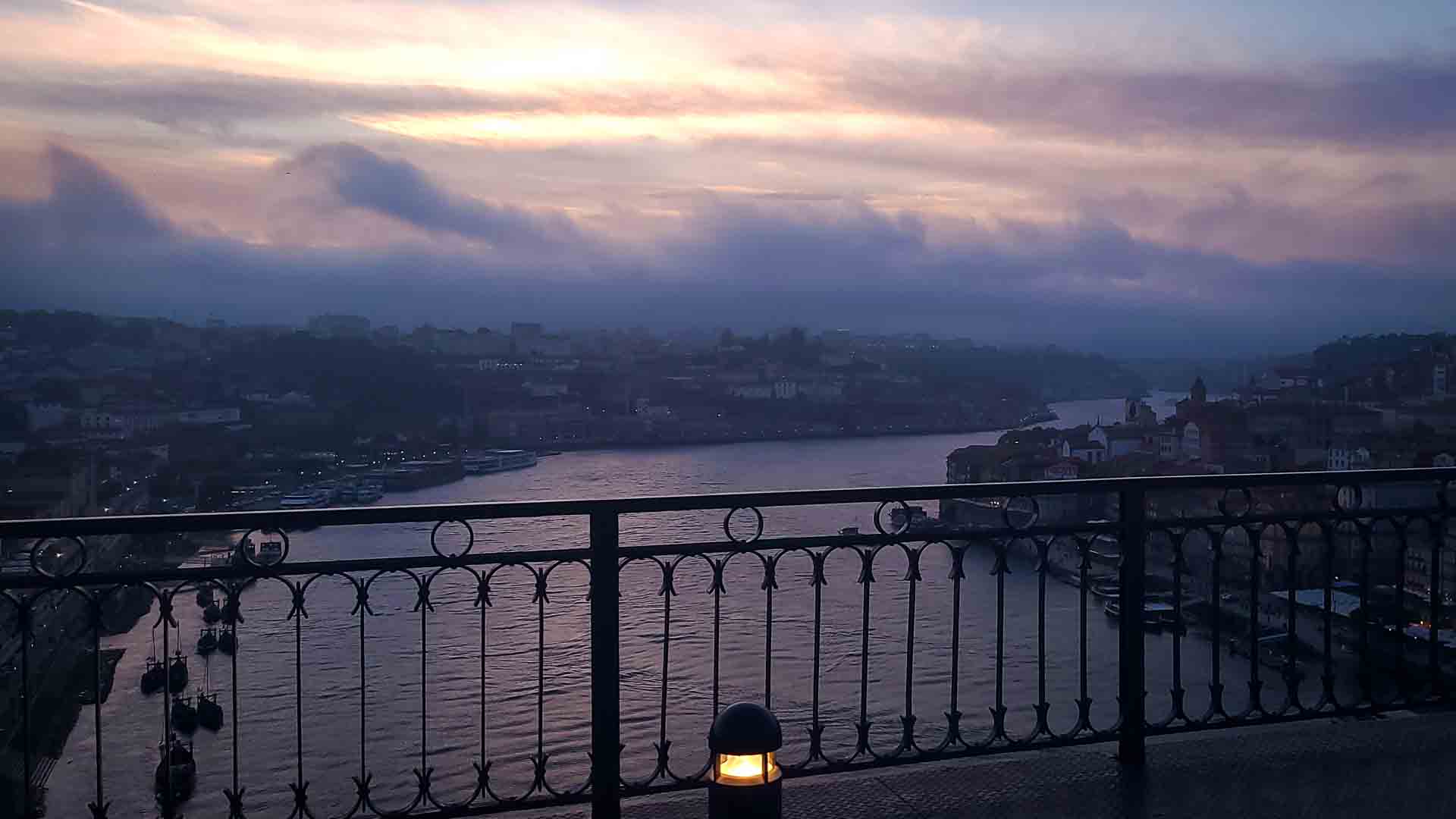 What to do in Porto Portugal sunset from Luis 1 Bridge in Porto Portugal
