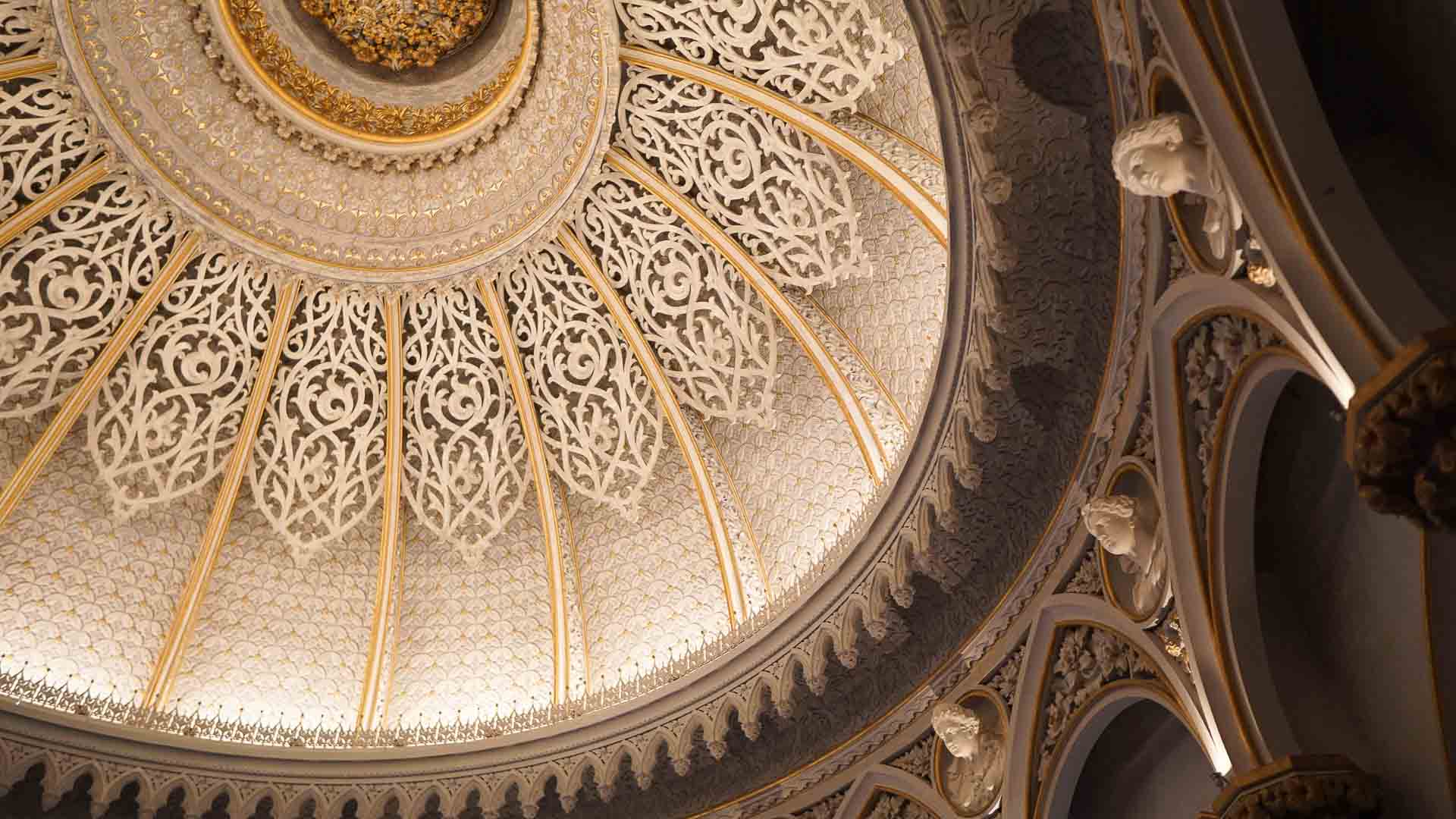 Photo of the ornate Romanticism ceiling and Busts in Monserrate Palace in Sintra Portugal