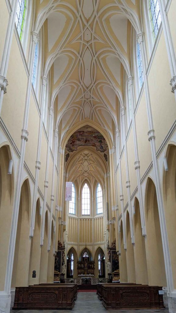 The long nave of the Cathedral of Assumption of Our Lady and St. John the Baptist in Kutna Hora