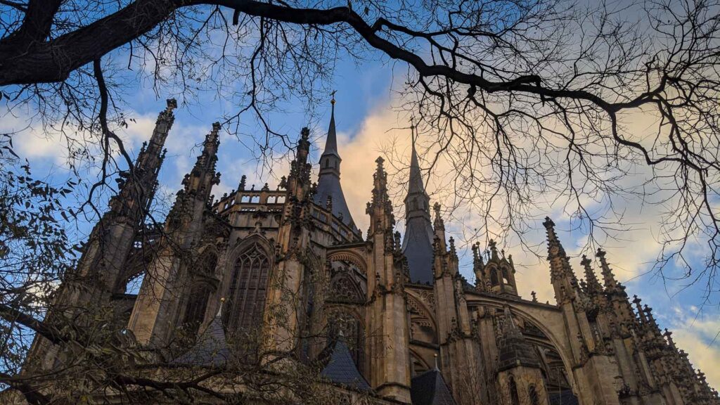 An eerie exterior photo of St. Barbara's Cathedral in Kutna Hora