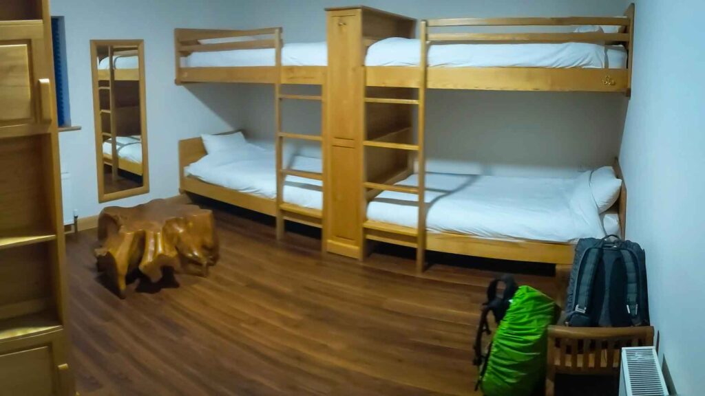 Built-in dorm bunk beds with super comfy pillows and mattresses at Ballyhoura Luxury Hostel