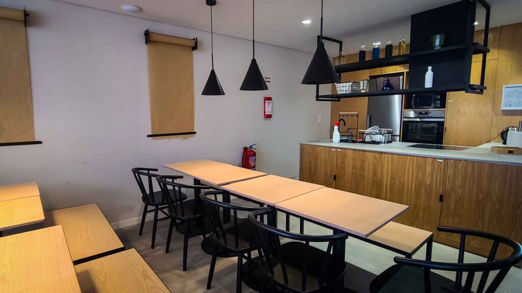 The kitchen and dining at The Gallery Hostel in Porto, Portugal