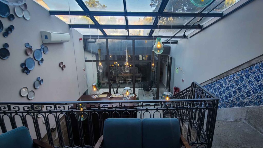 Looking down on the kitchen and dining room at The Gallery Hostel in Porto