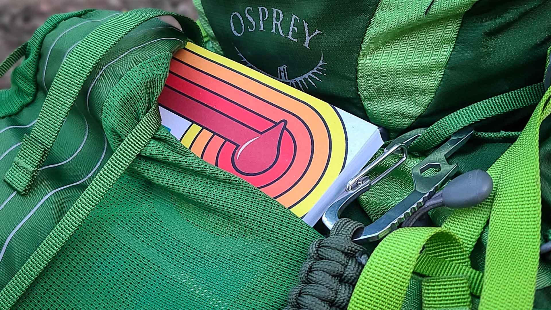 Hiking with diabetes journal in an osprey backpack