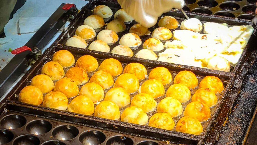 Making squid balls at a night market in Taipei