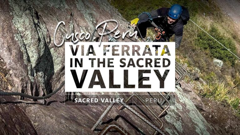 via ferrata in the sacred valley of peru travel guide slide with a man climbing the side of a mountain going up rebar steps in safety gear